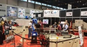 One of Universal Tool and Engineerings automated workcells complete with cnc pipe bender, yaskawa robot arm and automated part loader